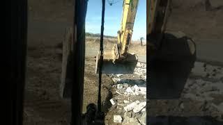 Installing a driveway with the kobelco 135