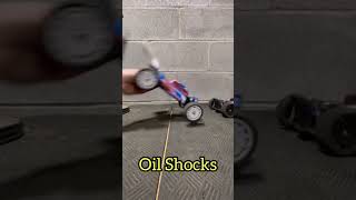 Friction Shocks vs Oil Filled Shocks