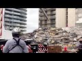 florida rescue crews tackle collapsed building debris