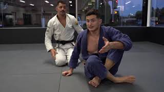 LOOP CHOKE VARIATION FROM HALF GUARD