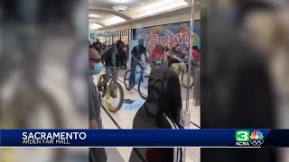 VIDEO: Dozens ride bikes through Arden Fair Mall