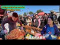 China Beijing, suburban market, street food, stewed pork, rice candy / 4k