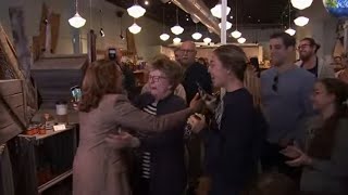 Kamala Harris embraces crying woman at Pittsburgh store