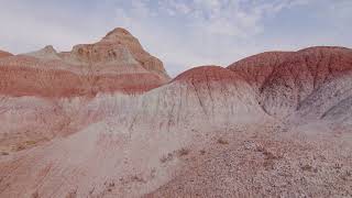 Stock Video - Walking through the dry Wyoming desert viewing the cracked terrain