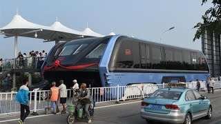 Massive car-straddling bus completes test journey in China (Tomorrow Daily 402)