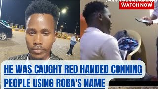 He was caught red handed conning people using Roba's name.