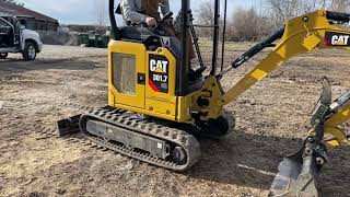 How to narrow and widen tracks on CAT 301.7 mini excavator