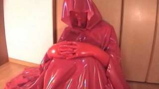 red rubber mask rubber cape