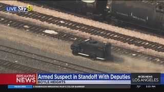 Suspect reportedly communicating with police