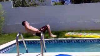 Front flip into pool (slow mo)