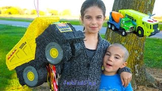 Opening a Piñata with Surprise Toys! Dump Truck and Construction Trucks! | JackJackPlays