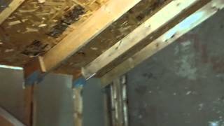 Partially finished floor joists in attic