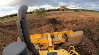 Komatsu D61 filling in borrow pit