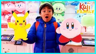 Ryan plays crane machine games and win prizes at the arcades!!!