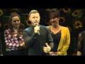 Gary Barlow on stage with 'The Girls'