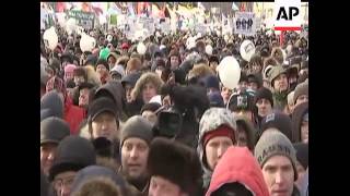 Tens of thousands of Russians flooded downtown Moscow on Saturday to demand an end to Prime Minister