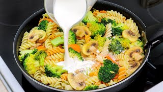 Creamy pasta with broccoli in a pan.