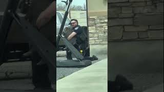 Loose pig tackled by police officer in Utah