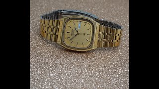 1983 Seiko SQ men's vintage watch with full length original bracelet.  Model reference 8123-5110