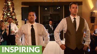 Groom and best friend light up wedding dance floor