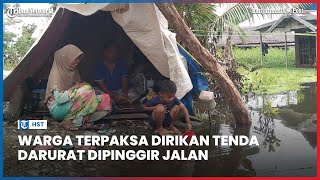 Rumah Terendam Banjir, Empat Kepala Keluarga di HST Gunakan Tenda Darurat di Bahu Jalan Umum