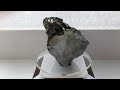 big elite shungite crystal 244 grams exhibition stand