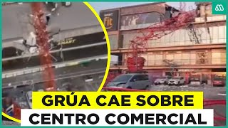 Impactante accidente: Grúa de construcción colapsa sobre centro comercial en Arica