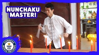 Most candles extinguished with nunchucks - Guinness World Records