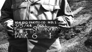 Testing of a captured 1941 Japanese tank by allies:  Climbing a steep dirt mound HD Stock Footage