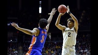 Michigan's Jordan Poole scores 19 points in second round victory over Florida