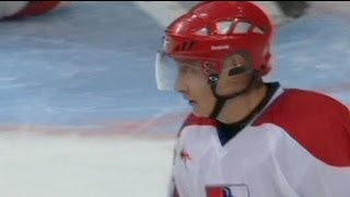 Putin plays ice hockey