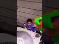 Kid gets shot with a Nerf gun in slow motion