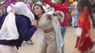 College girls enjoying cultural dance at Surajkund Mela