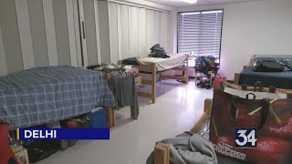 SUNY Delhi students living in dorm lounges