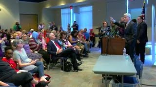 GOP lawmakers face angry crowds at town halls