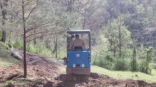 Mini excavator builds access road in the hills of Eastern Kentucky