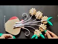 unique wall hanging craft using pista shells best out of waste cardboard home decoration ideas