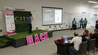 Team "Urban Wizards" presents at Tech Hub Hackathon 2024.