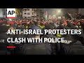 Anti-Israel protesters clash with police near Israeli embassy in Amman