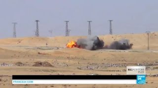 EXCLUSIVE - Syria: Kurds destroy a suicide bomber's truck filled with explosives coming at them