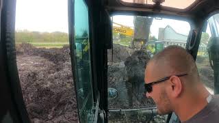 BOBCAT E165 digging pond