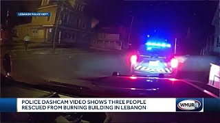 Dashcam video shows police officers helping people trapped by fire