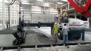 FAM Flooring division using Somero SXP-D laser screed