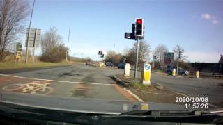 Braindead Driver Stops For Red Light