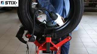 Professional tyre repair stand – pneumatic tyre spreader.