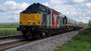 ROG 37884 'Cerpheus' drags Grand Central ECS + 82200 seen passing a crossing nr. Trowbridge 04/05/22