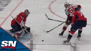 Devils' Haula Lets Puck Gently Slide Past Kuemper After Carlson Prevents Him From Deking