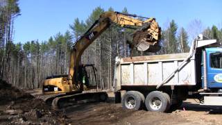 Cat 315DL Loading Dump Truck