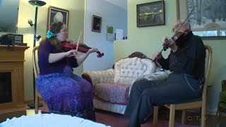 Unlikely friends: Senior, young mother bond over fiddle-playing