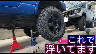 JB23ジムニー7.00Ｒ１６履いて初のタイヤ交換ジャッキ全上げでもほとんど浮かないSUZUKI　SAMURAI 7.00R16 Tire change Jack up Almost no lift